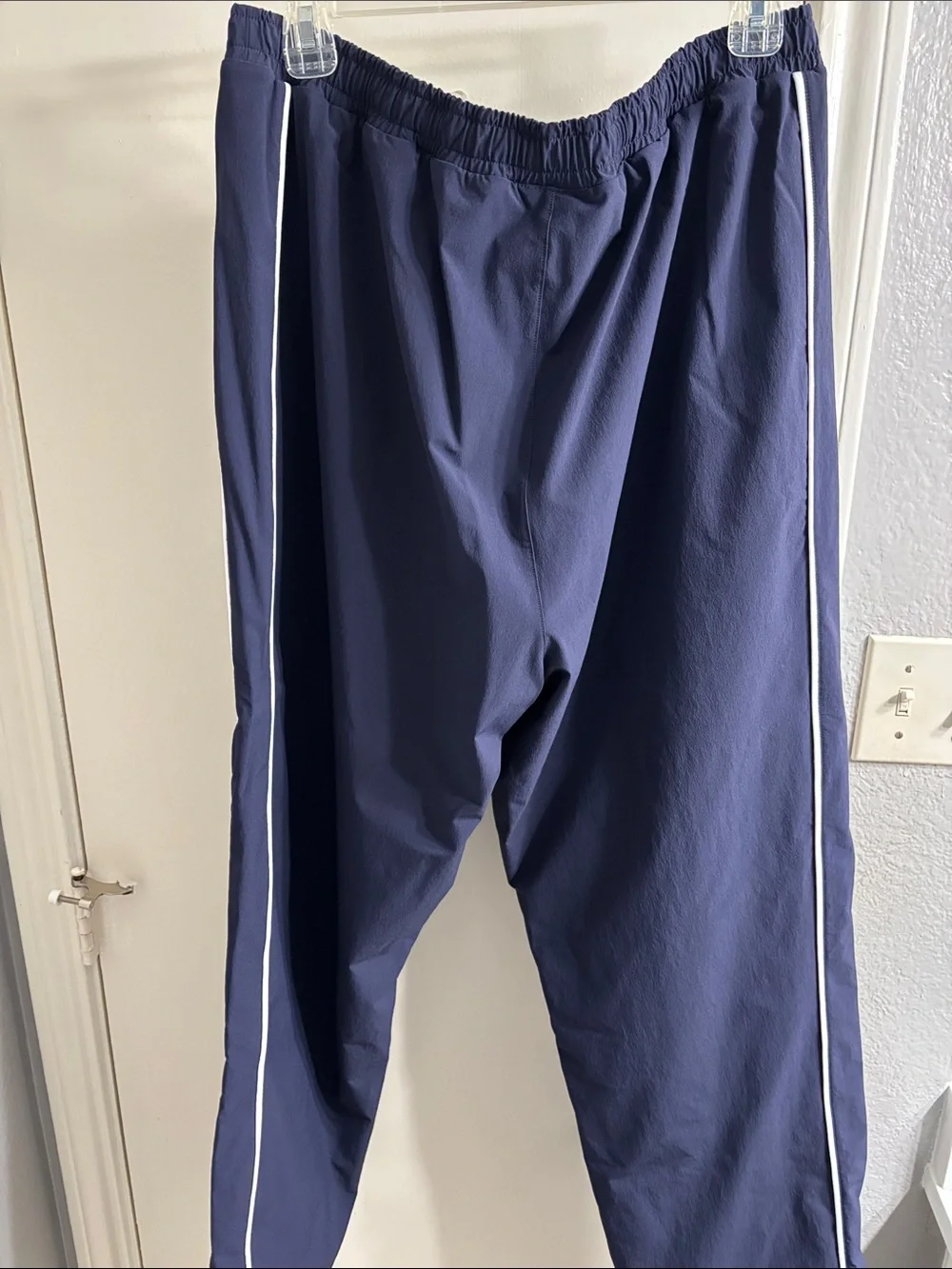 Gymshark Navy Track Pants with White Piping Accents